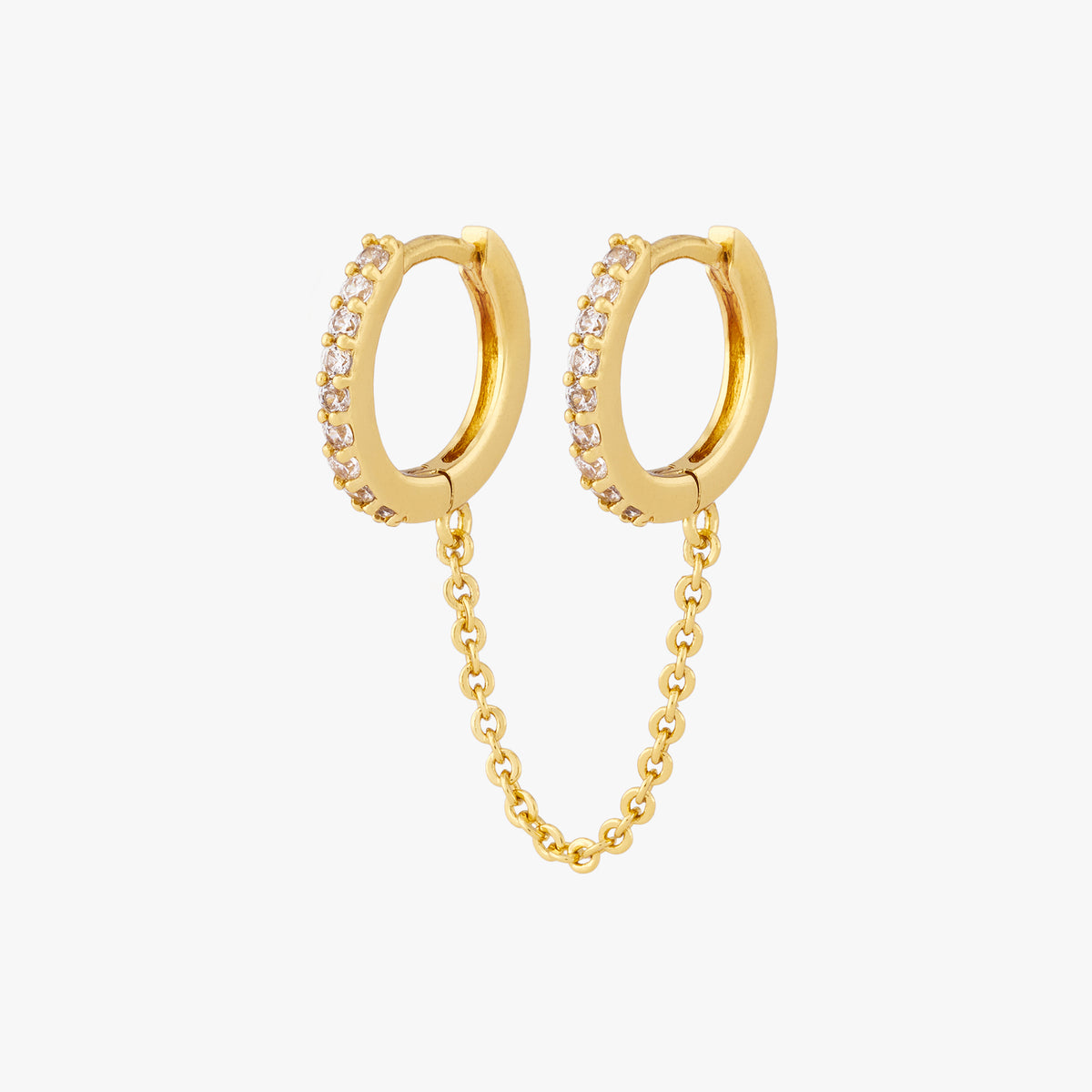 Two separate CZ front huggies attached by a gold chain. 