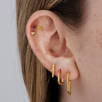 this image shows an earscape featuring the gold plated dagger stud