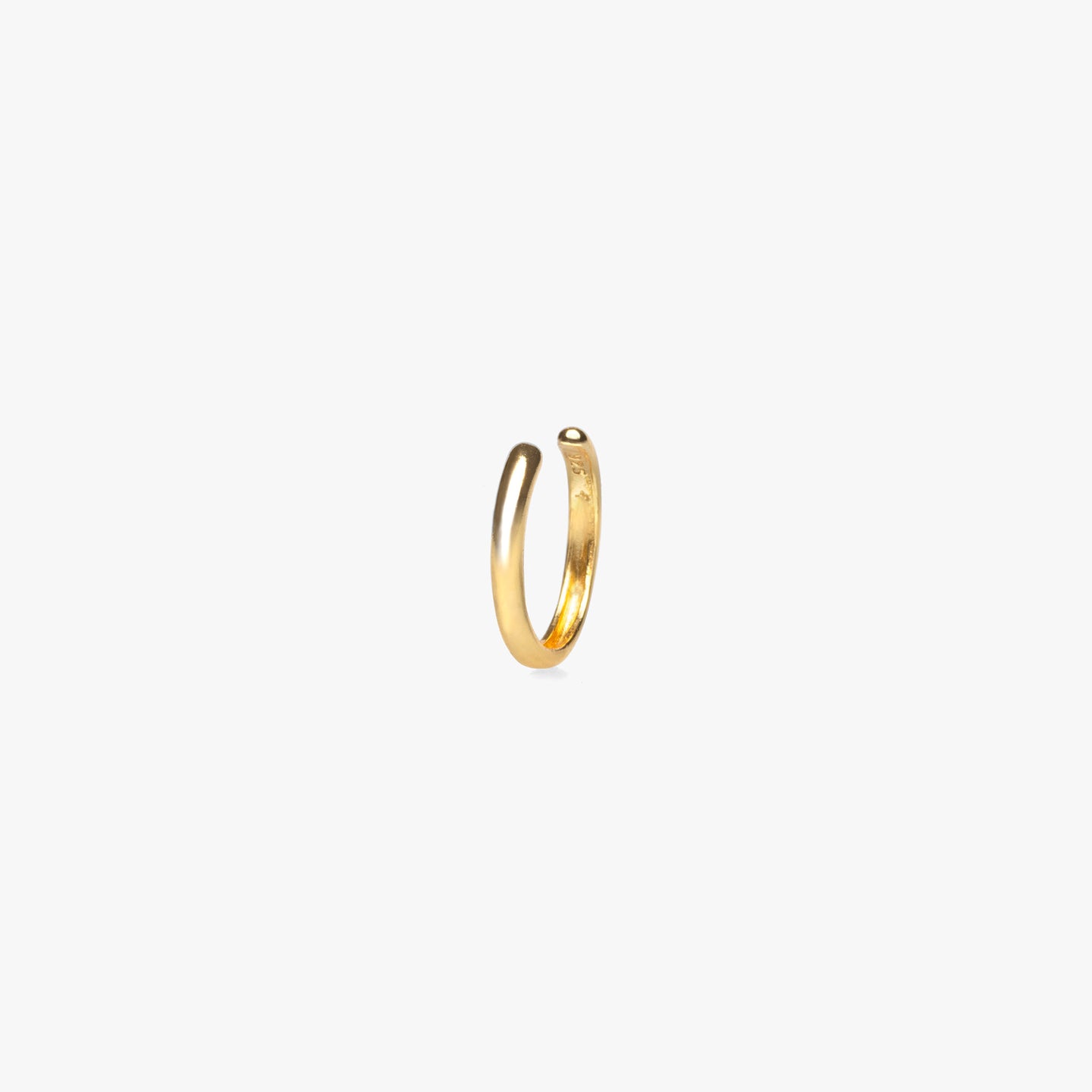 Slim gold ear cuff that requires no piercing. color:gold