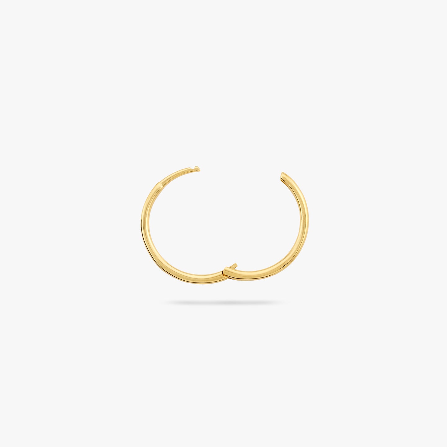 Medium sized slim simple gold hoop. color:null|gold