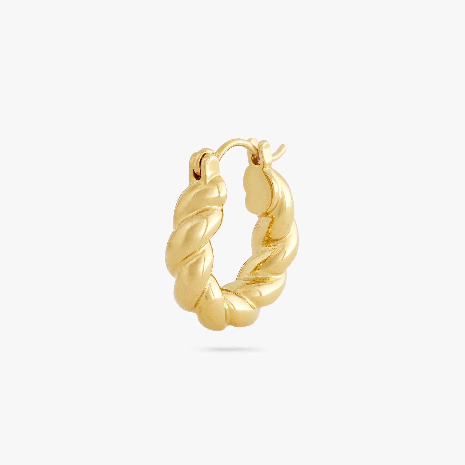 This is a small gold hoop with a twisted detail that clasps shut color:null|gold