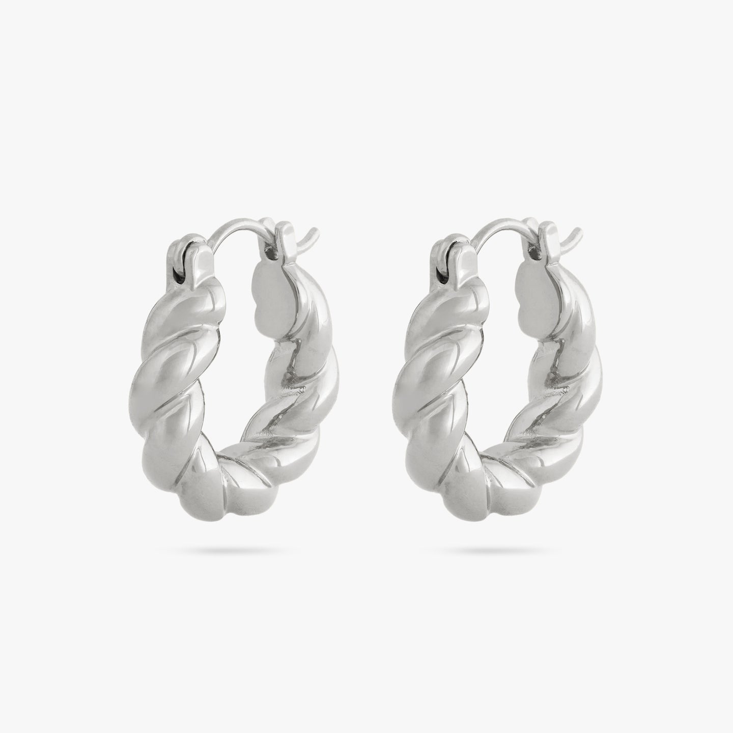 This is a pair of small silver hoops with twisted details [pair] color:null|silver