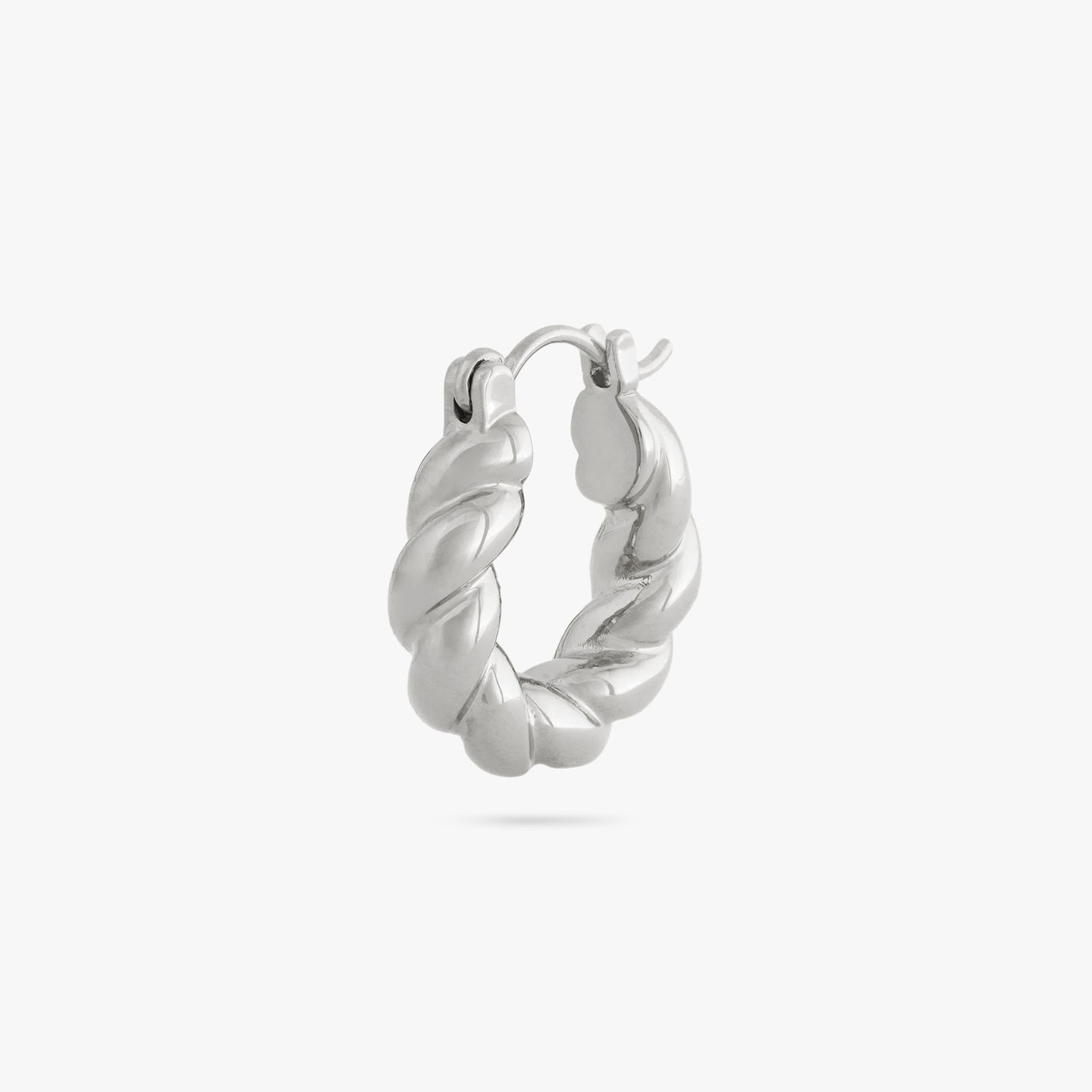 This is a twisted croissant-like silver hoop color:null|silver