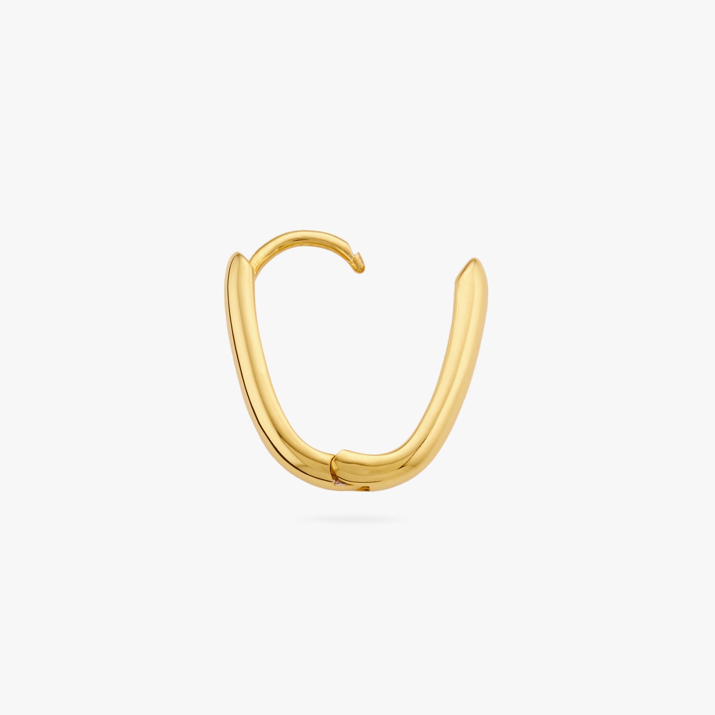 Medium sized gold hoop in the shape of an oval. color:null|gold