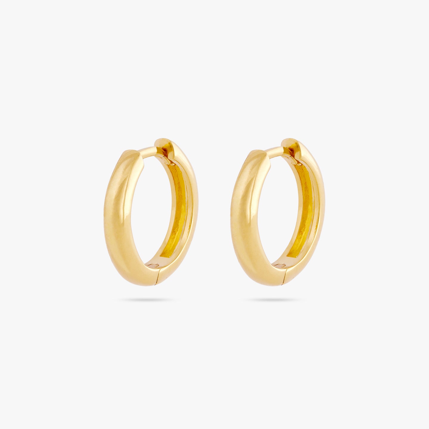 This is a pair of small bulky and chunky shaped gold hoops [pair] color:null|gold
