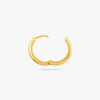 Small bulky and chunky shaped gold hoop and the clasp is undone color:null|gold