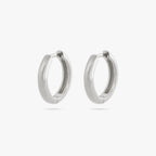 A pair of small bulky and chunky shaped silver hoops [pair] color:null|silver