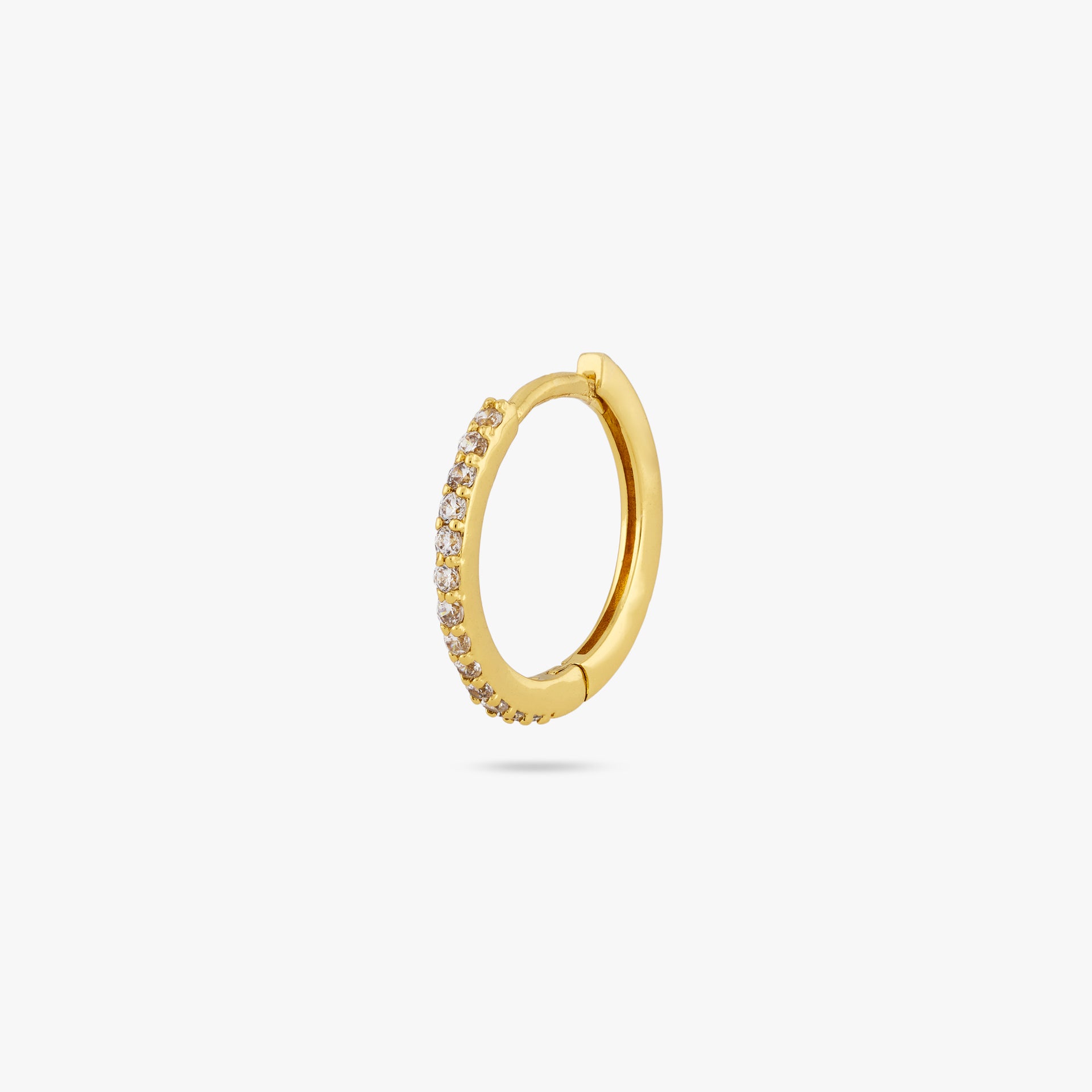 This is a small gold hoop with clear cz gems along the front color:null|gold/clear