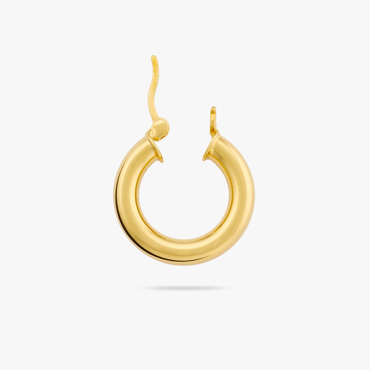 This is a small gold chunky tube hoop color:null|gold