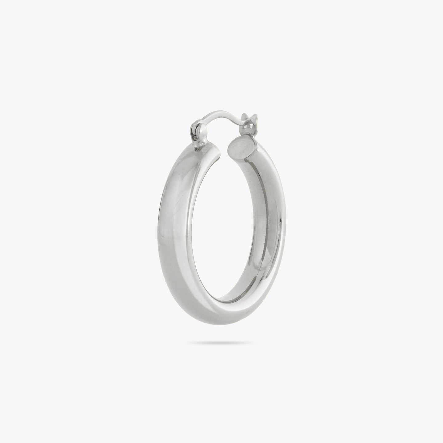 Large, thick silver hoop. color:null|silver