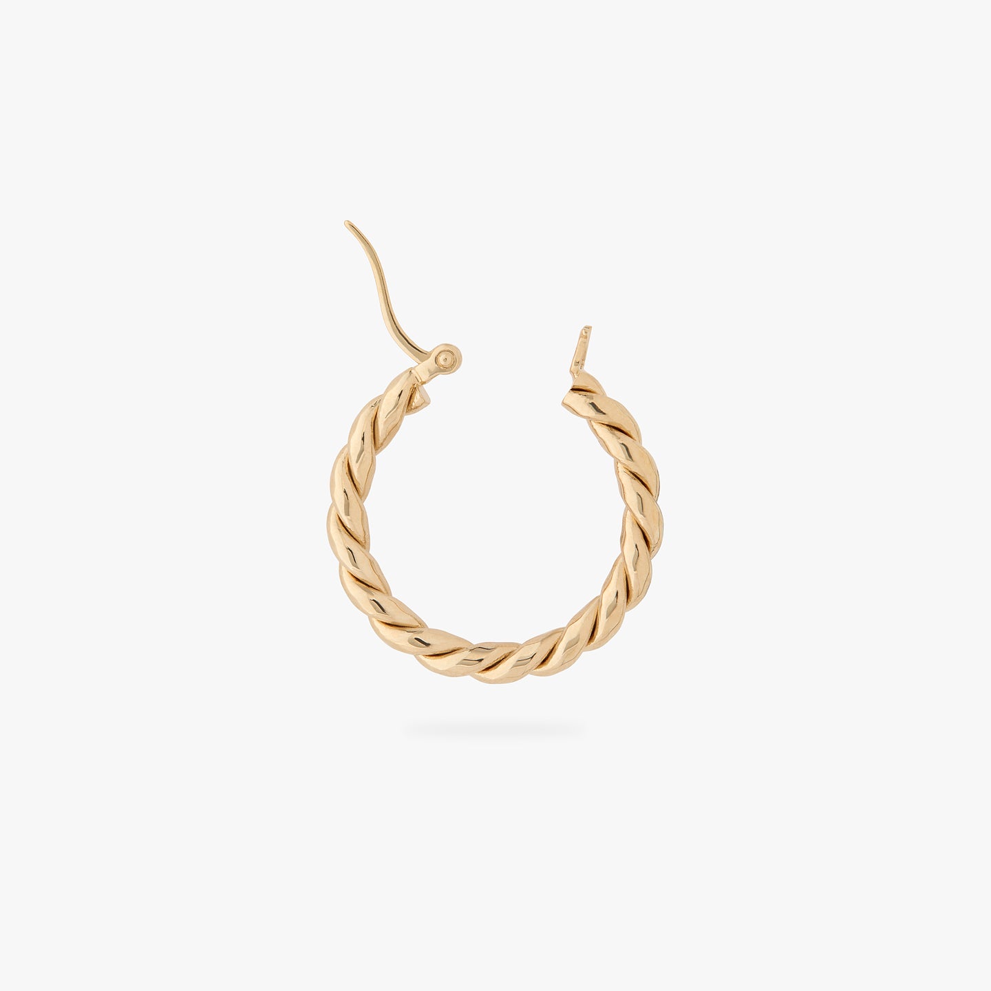 a small slim gold twisted hoop earring unhinged color:null|gold