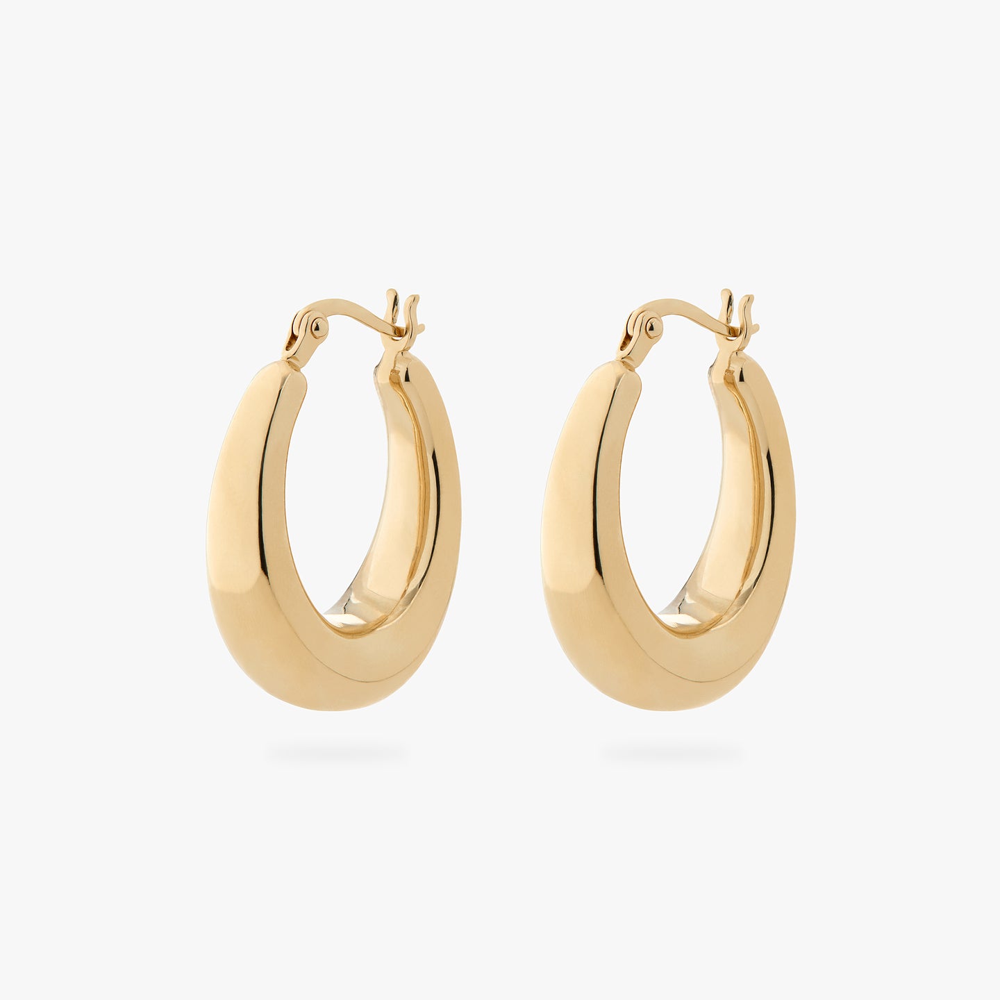 a pair of oval shaped hoop earrings in gold [pair] color:null|gold