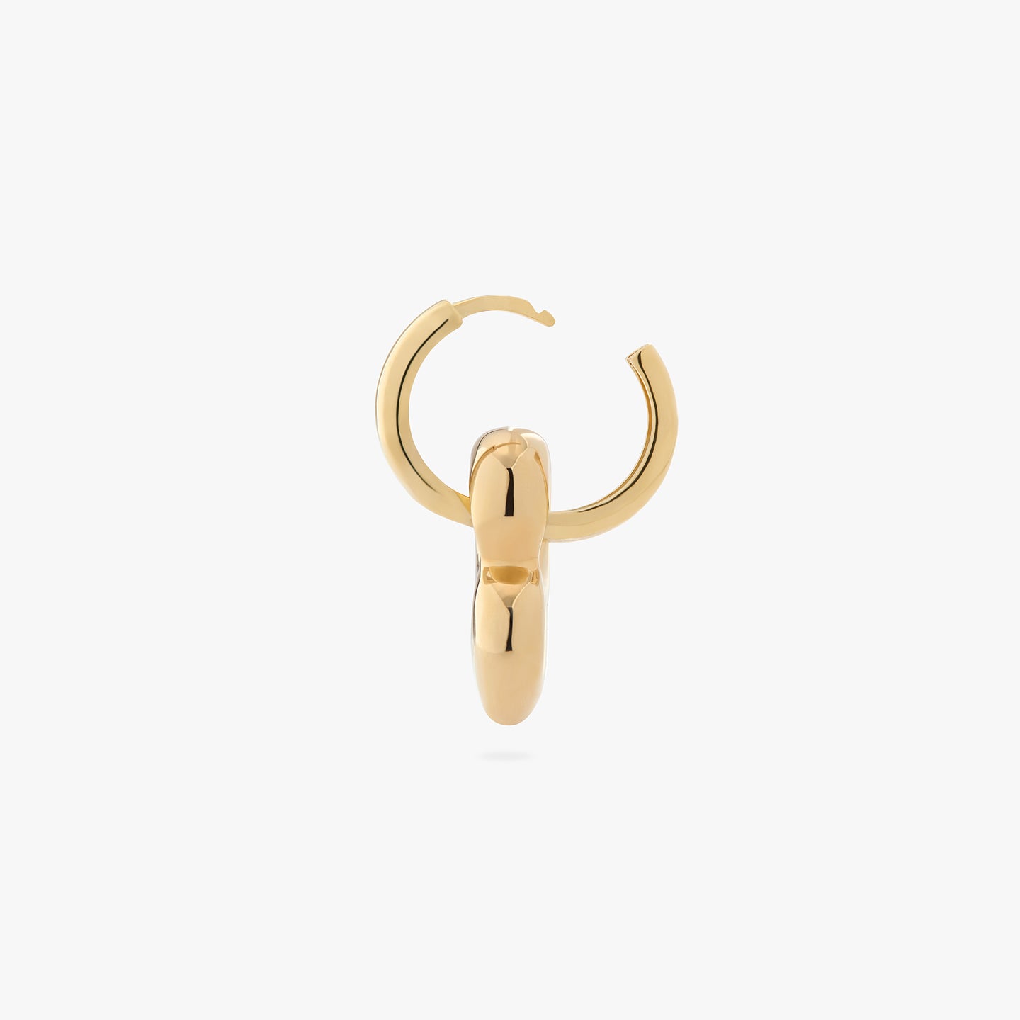 a chunky gold hoop that has a gold puffy heart charm on it color:null|gold