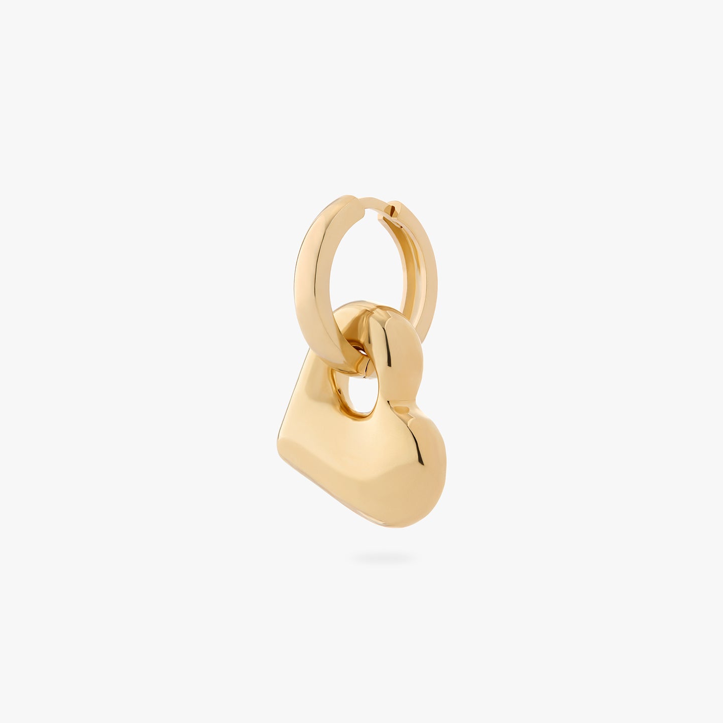 a chunky gold hoop that has a gold puffy heart charm on it color:null|gold