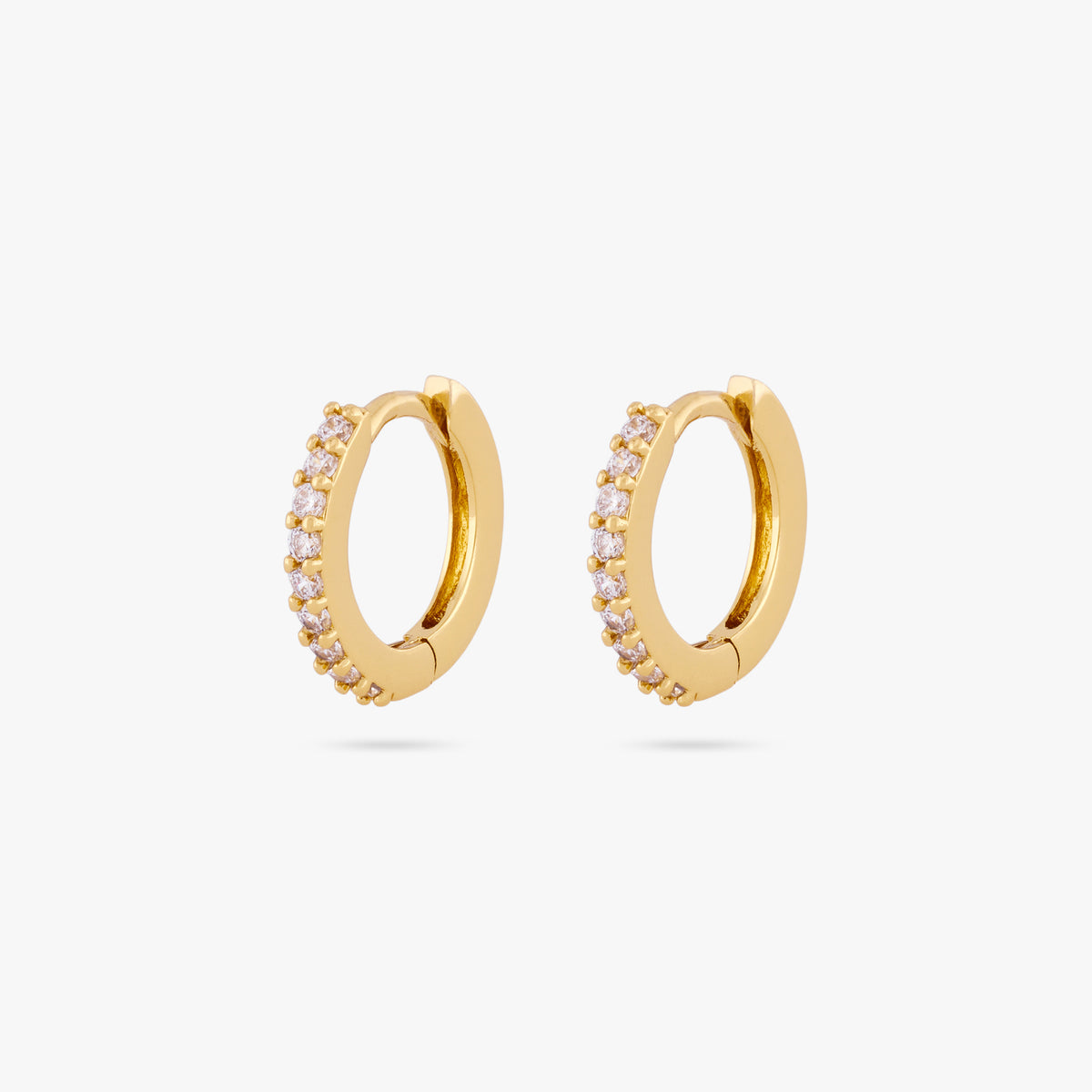 A pair of mini gold huggies lined with clear cz gems on the front [pair] color:null|gold/clear