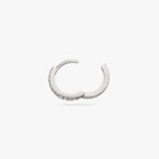 Silver huggie with clear CZs lining the front. color:null|silver/clear