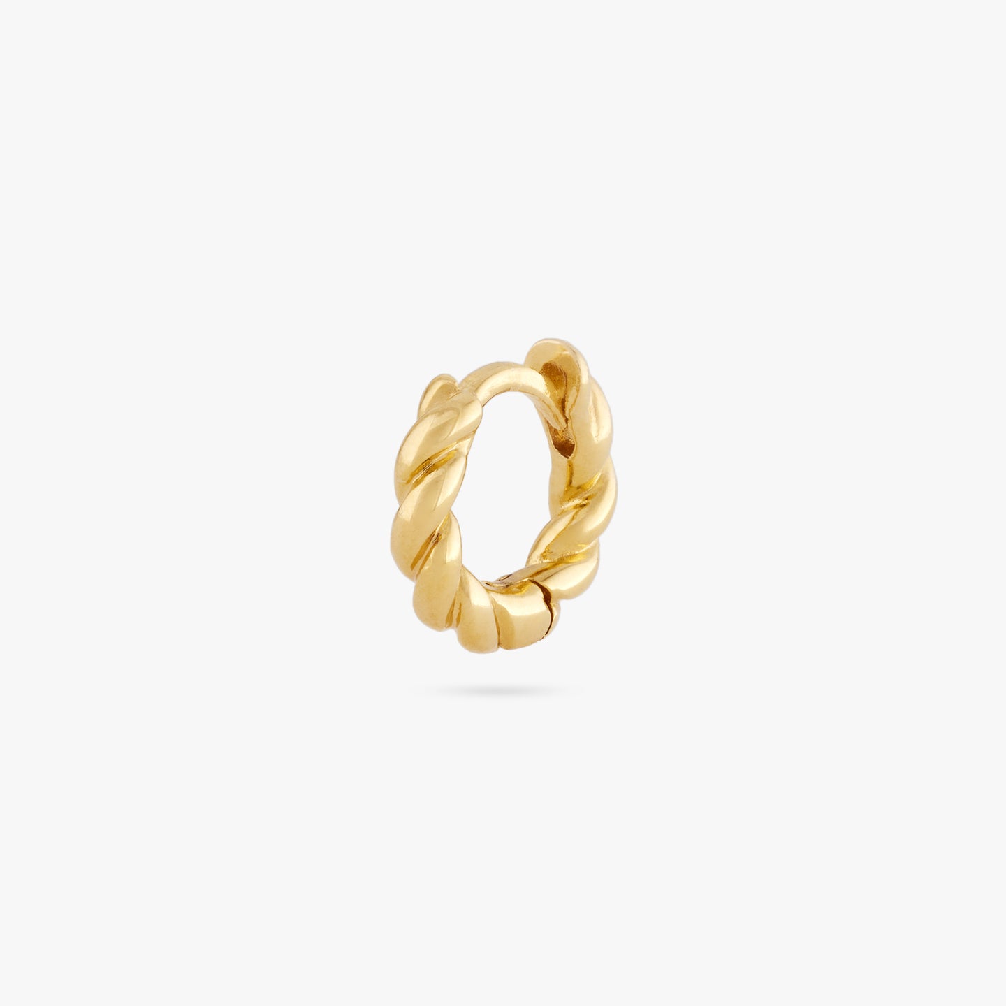 This is a twisted croissant-like gold hoop color:null|gold