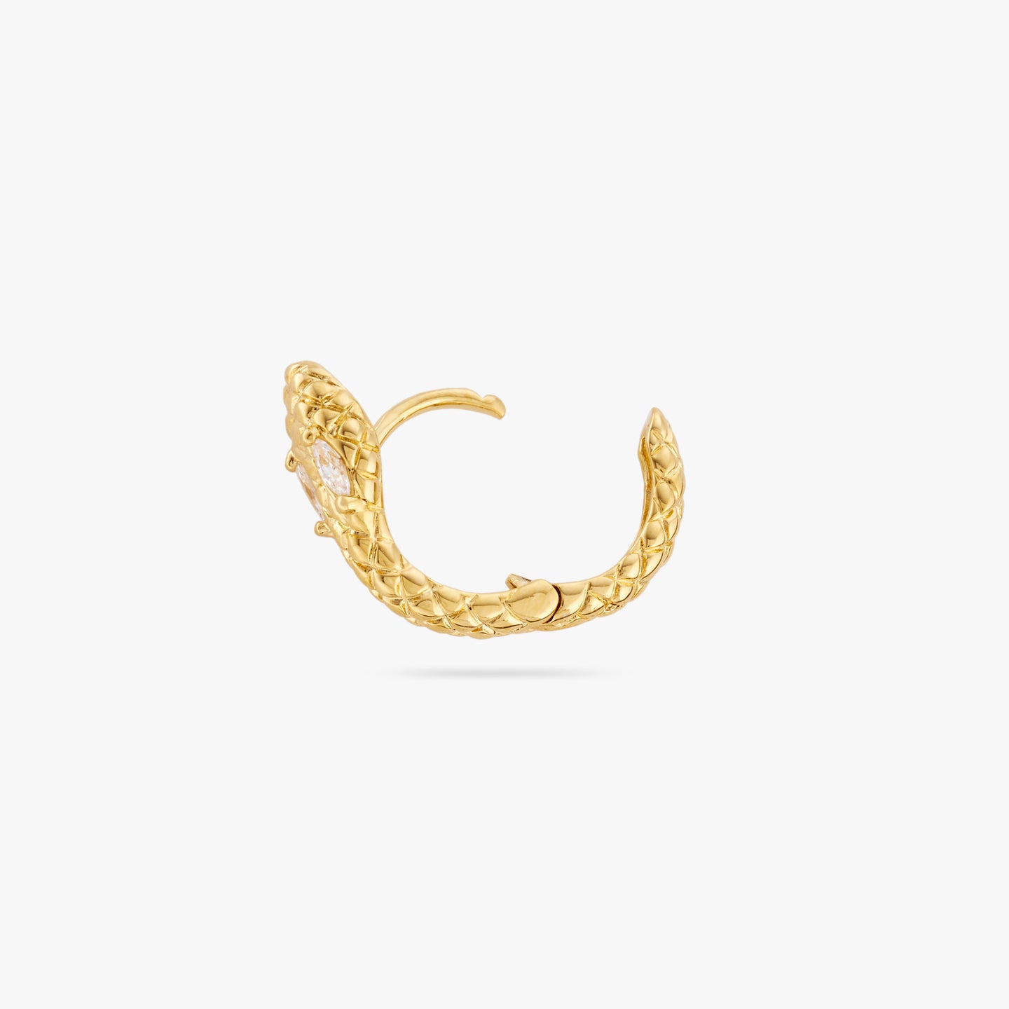 This is a gold serpent shaped huggie earring with clear CZ eyes and its clasp undone color:null|gold
