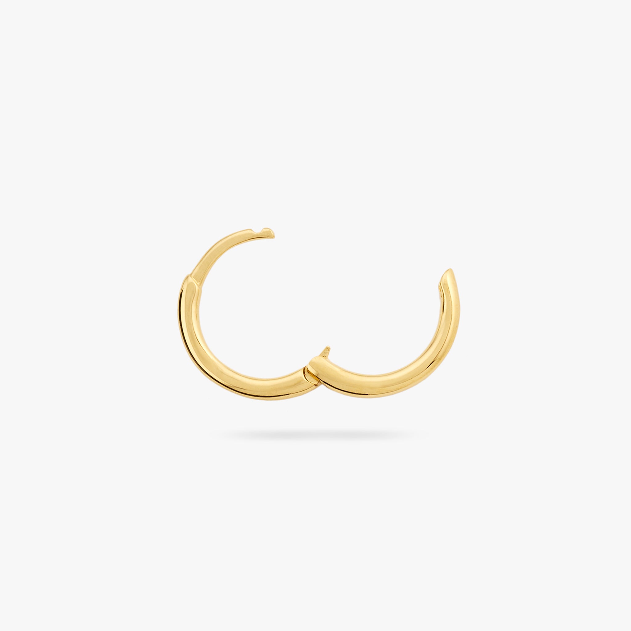 Small slim gold huggie. color:null|gold