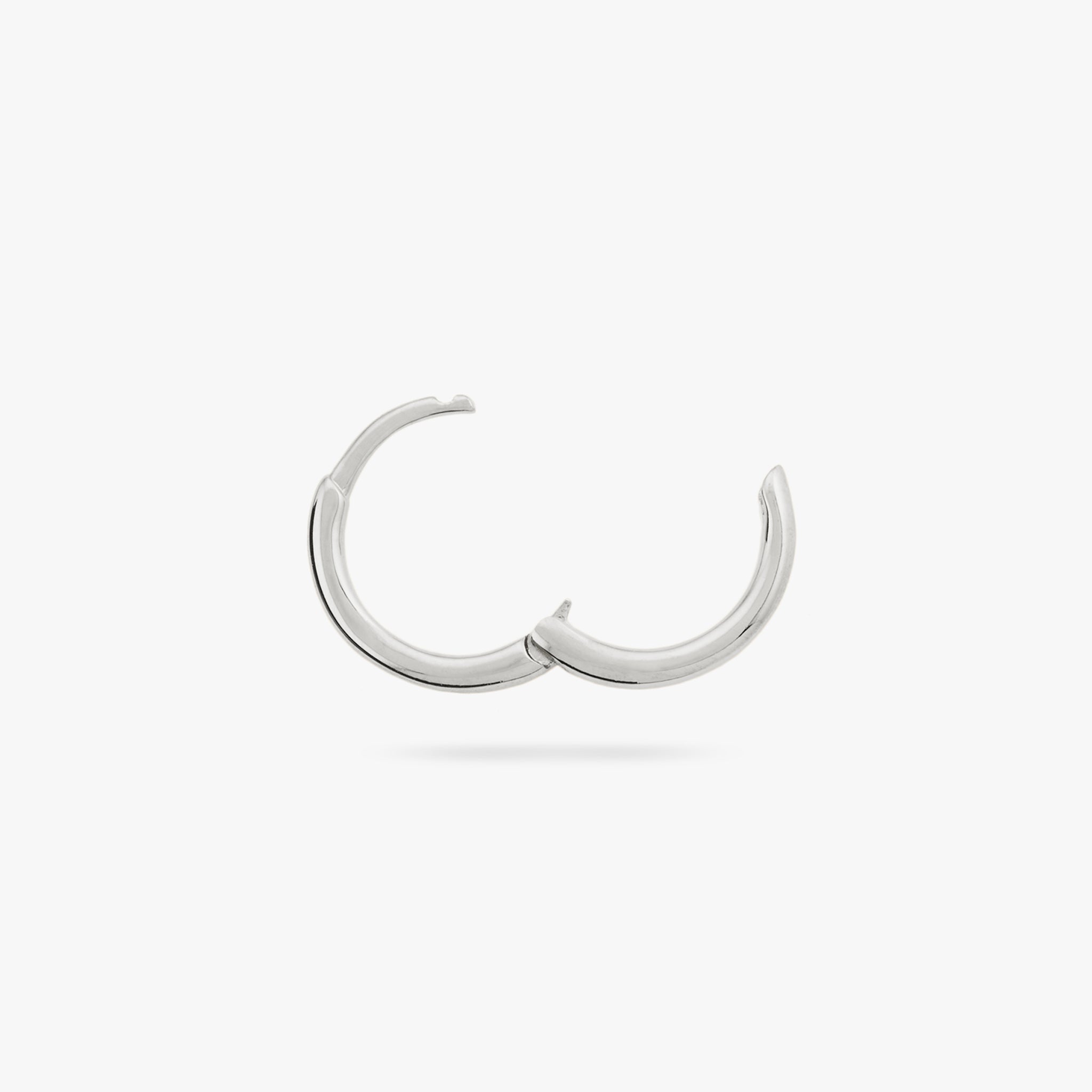 Small slim silver huggie. color:null|silver