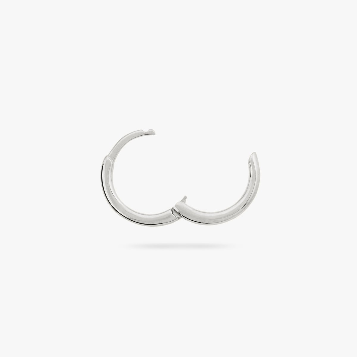 Small slim silver huggie. color:null|silver