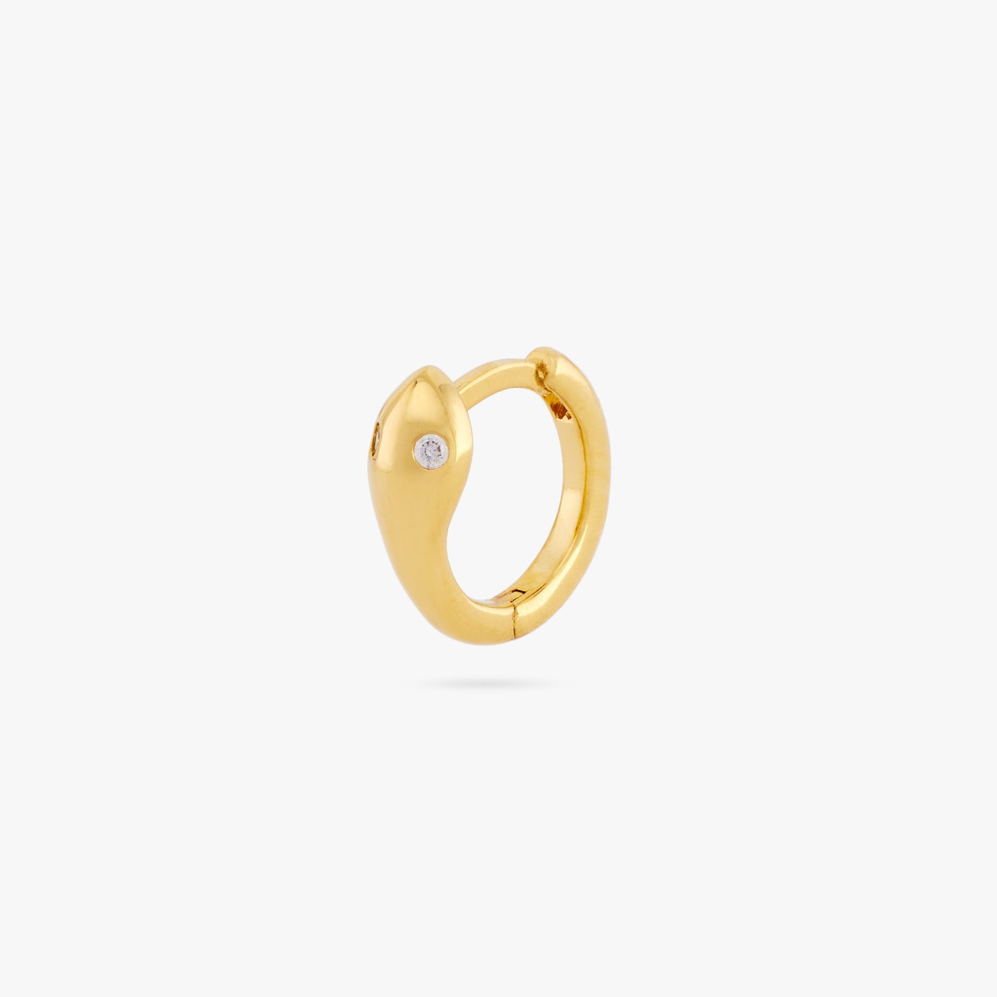 This is a gold serpent shaped huggie earring with a clear CZ eye color:null|gold