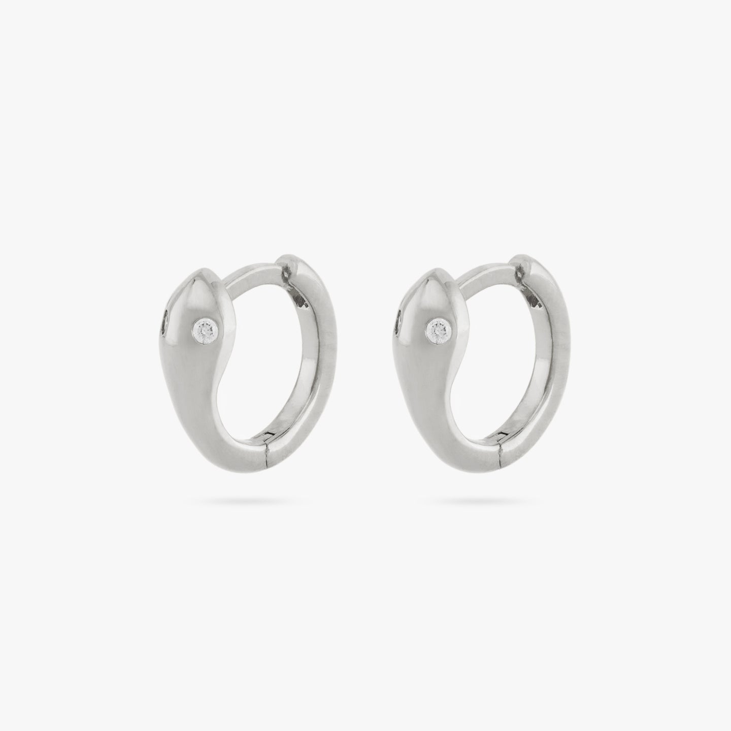 A pair of silver serpent bite huggies [pair] color:null|silver