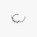 This is a micro huggie with three small silver daisy-shaped flowers color:null|silver