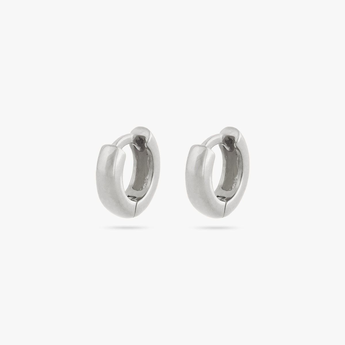 A pair of micro sized chunky silver huggies [pair] color:null|silver