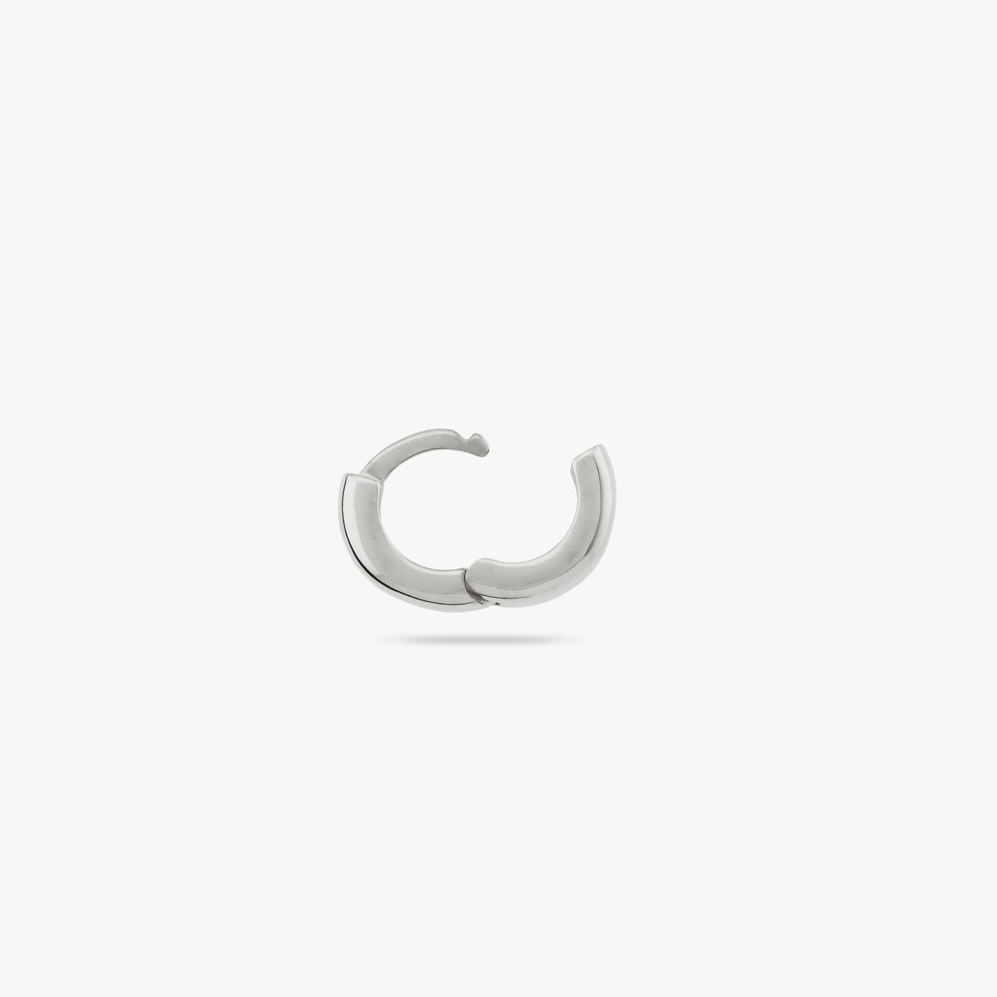 Micro sized chunky silver huggie color:null|silver