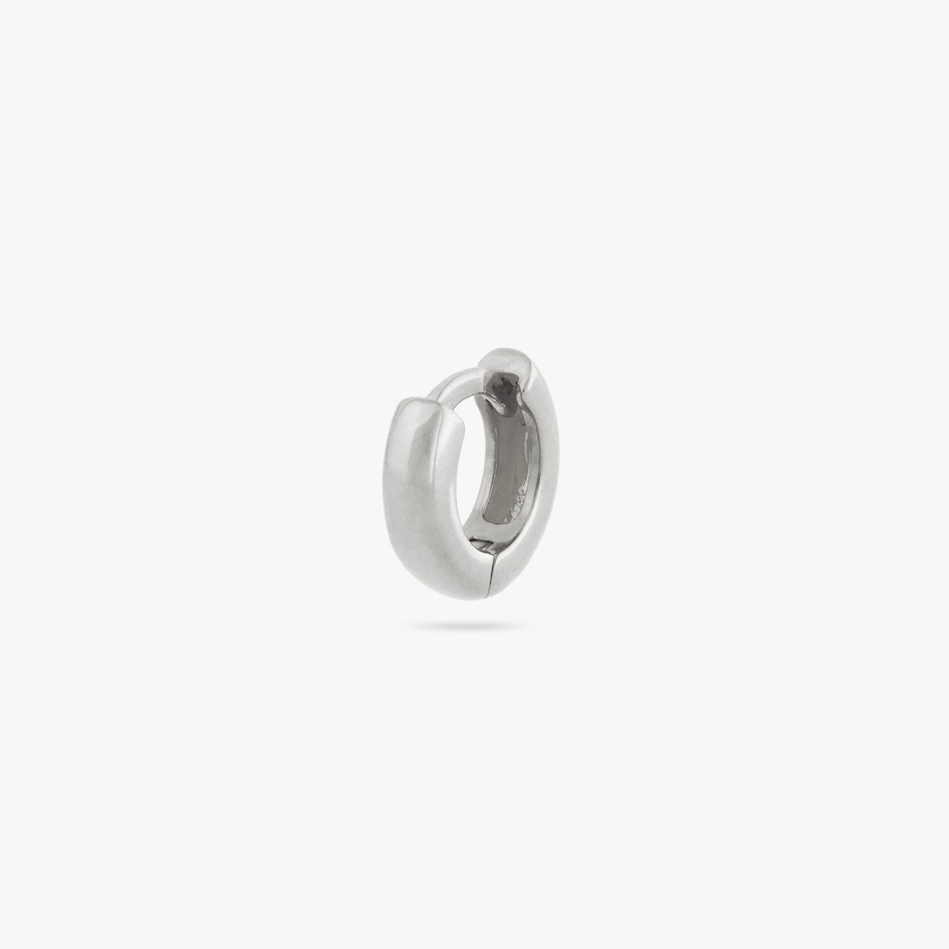 Micro sized chunky silver huggie - Main view