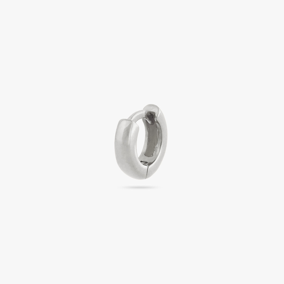 Micro sized chunky silver huggie color:null|silver