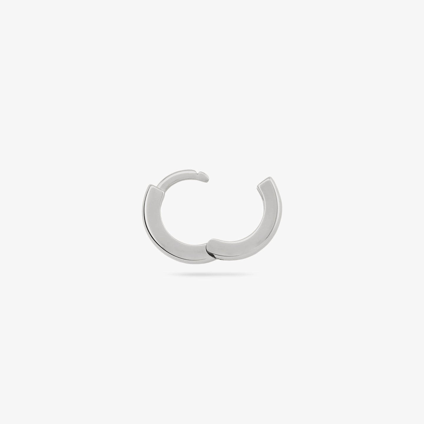Mini sized chunky silver huggie. color:null|silver