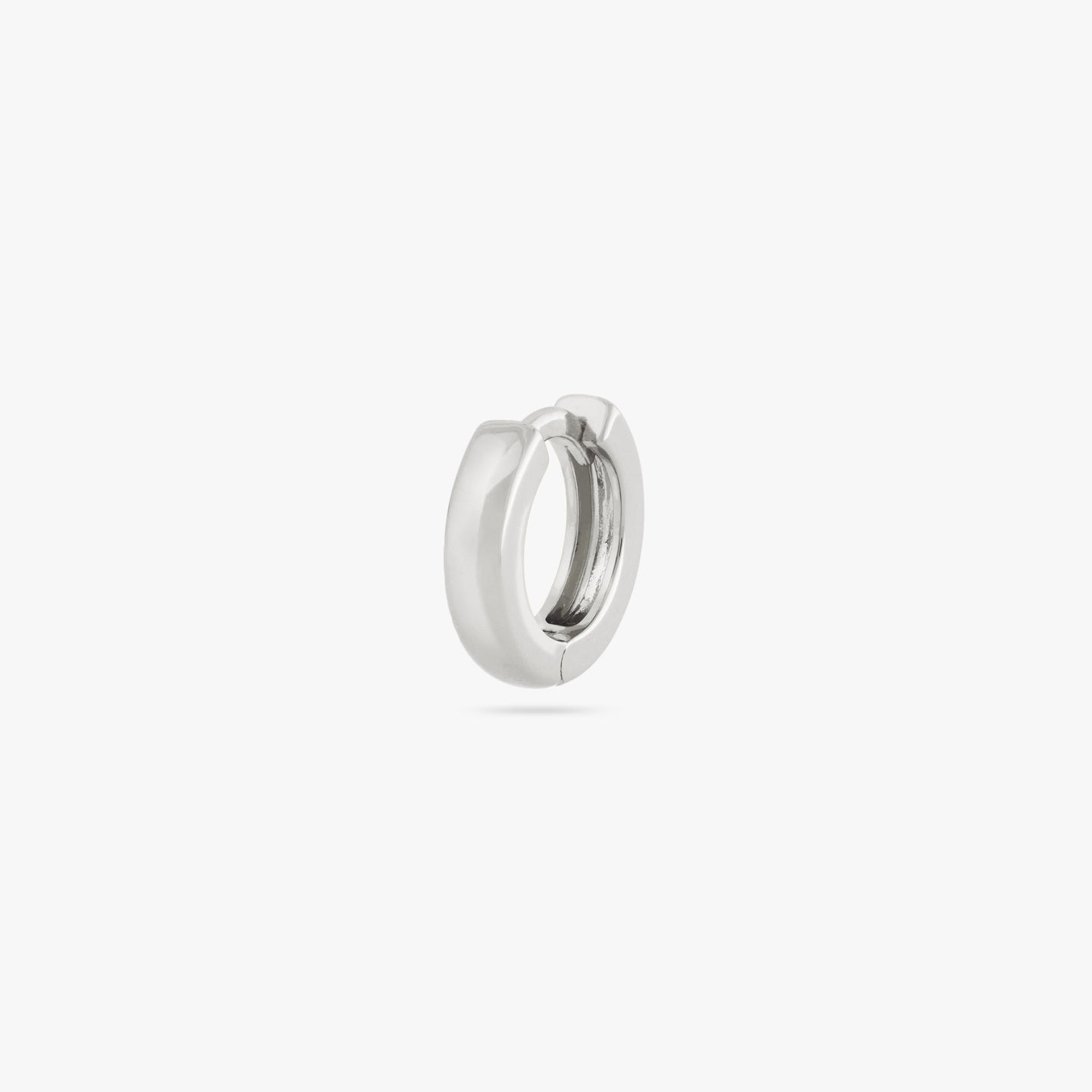 Mini sized chunky silver huggie. color:null|silver