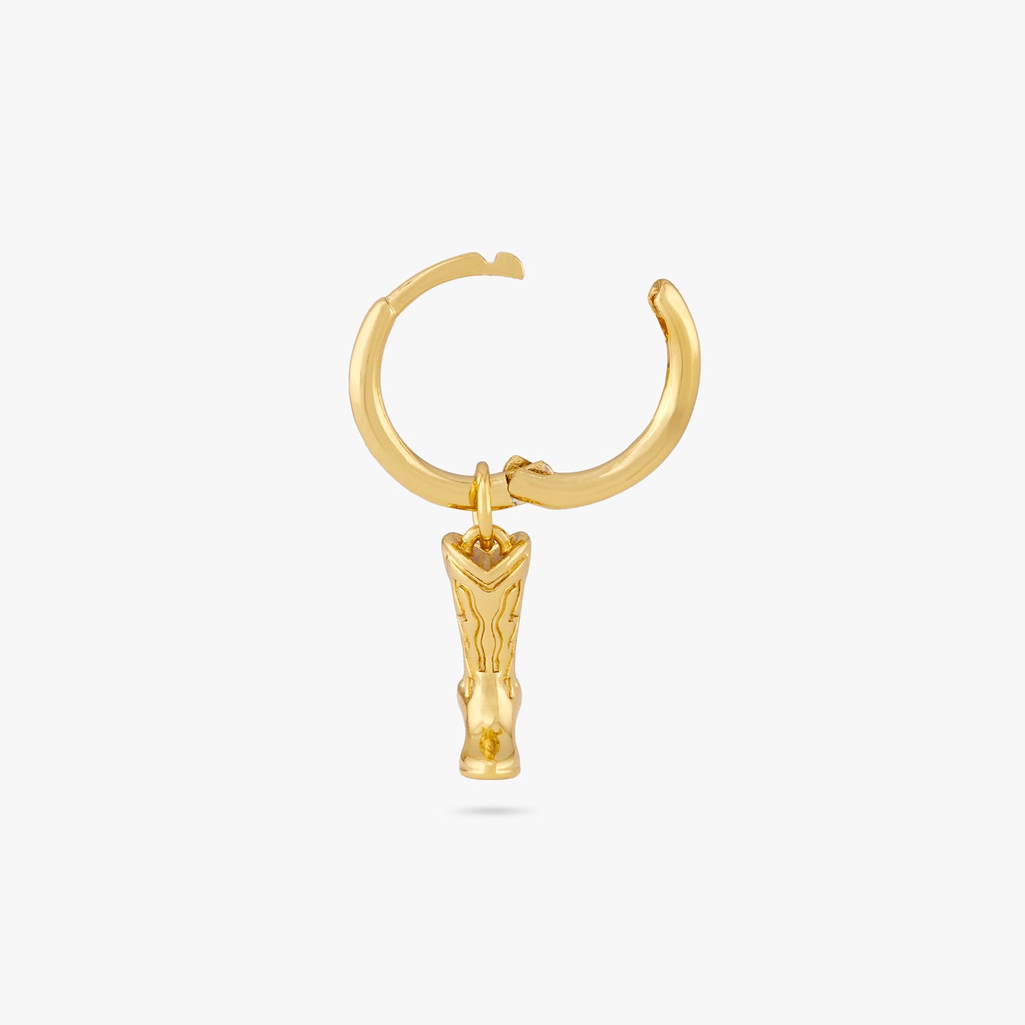 This is a gold cowboy boot charm dangling from a gold huggie and the clasp is undone color:null|gold