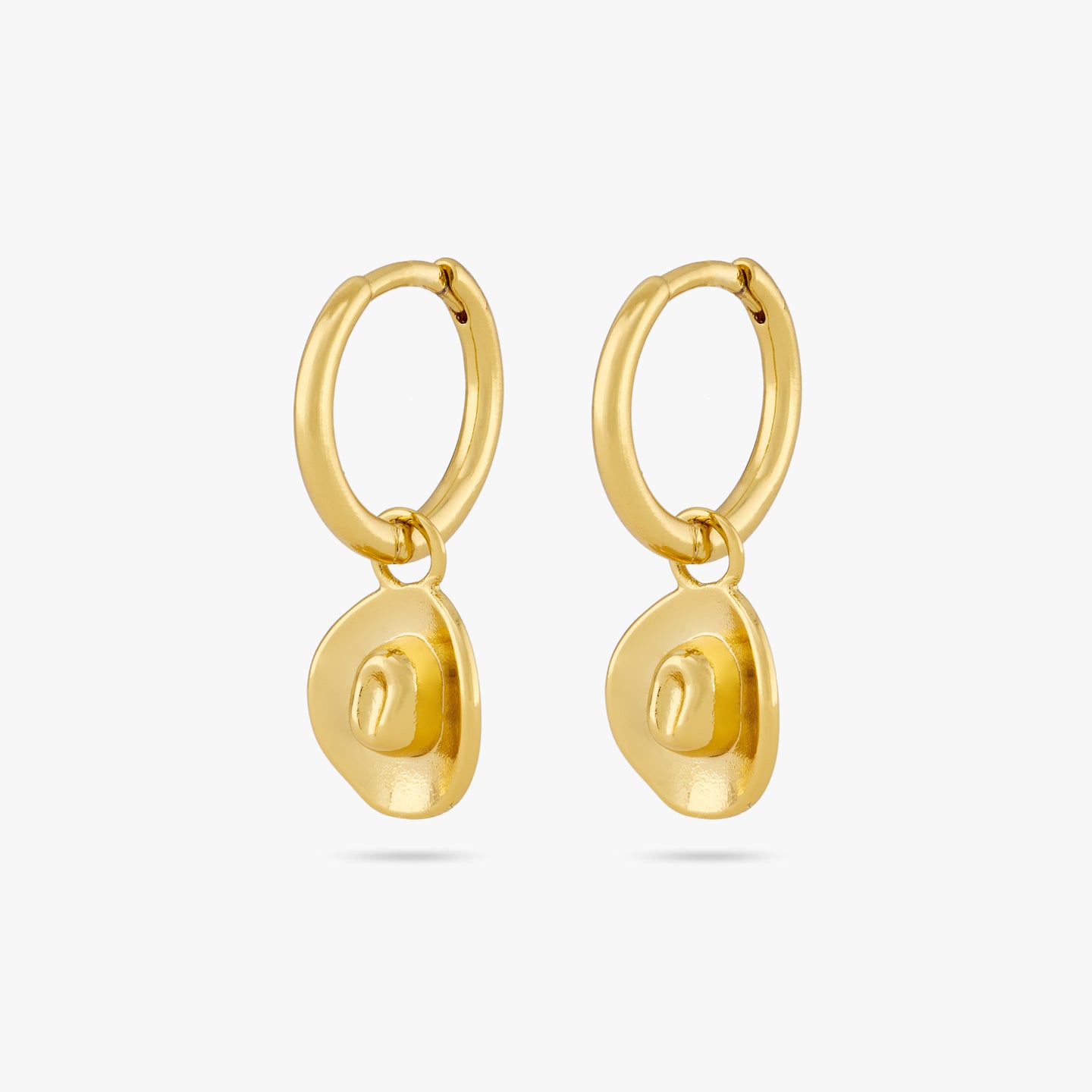 A pair of small gold huggies with a cowboy hat charm on an ear. [pair] color:null|gold