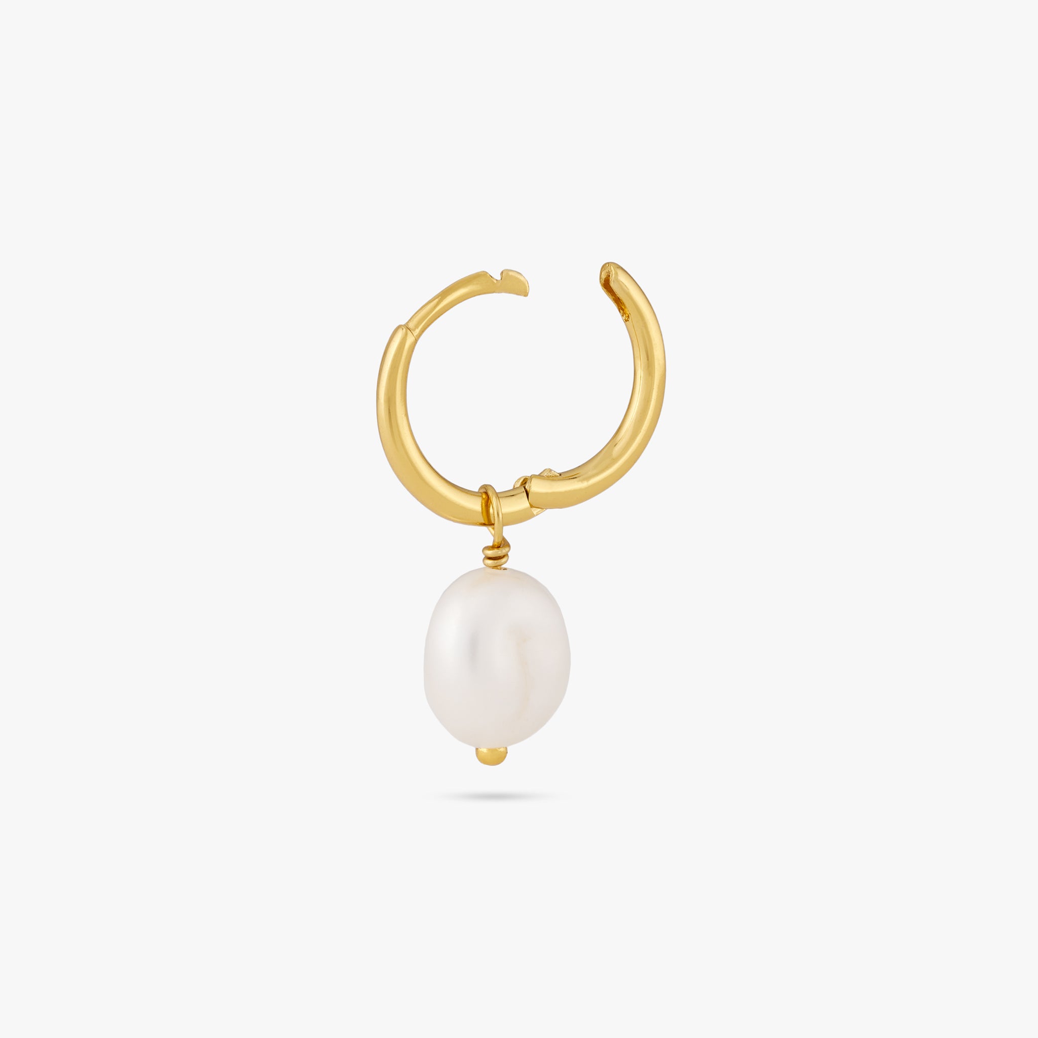 This is a dangling pearl huggie. color:null|gold