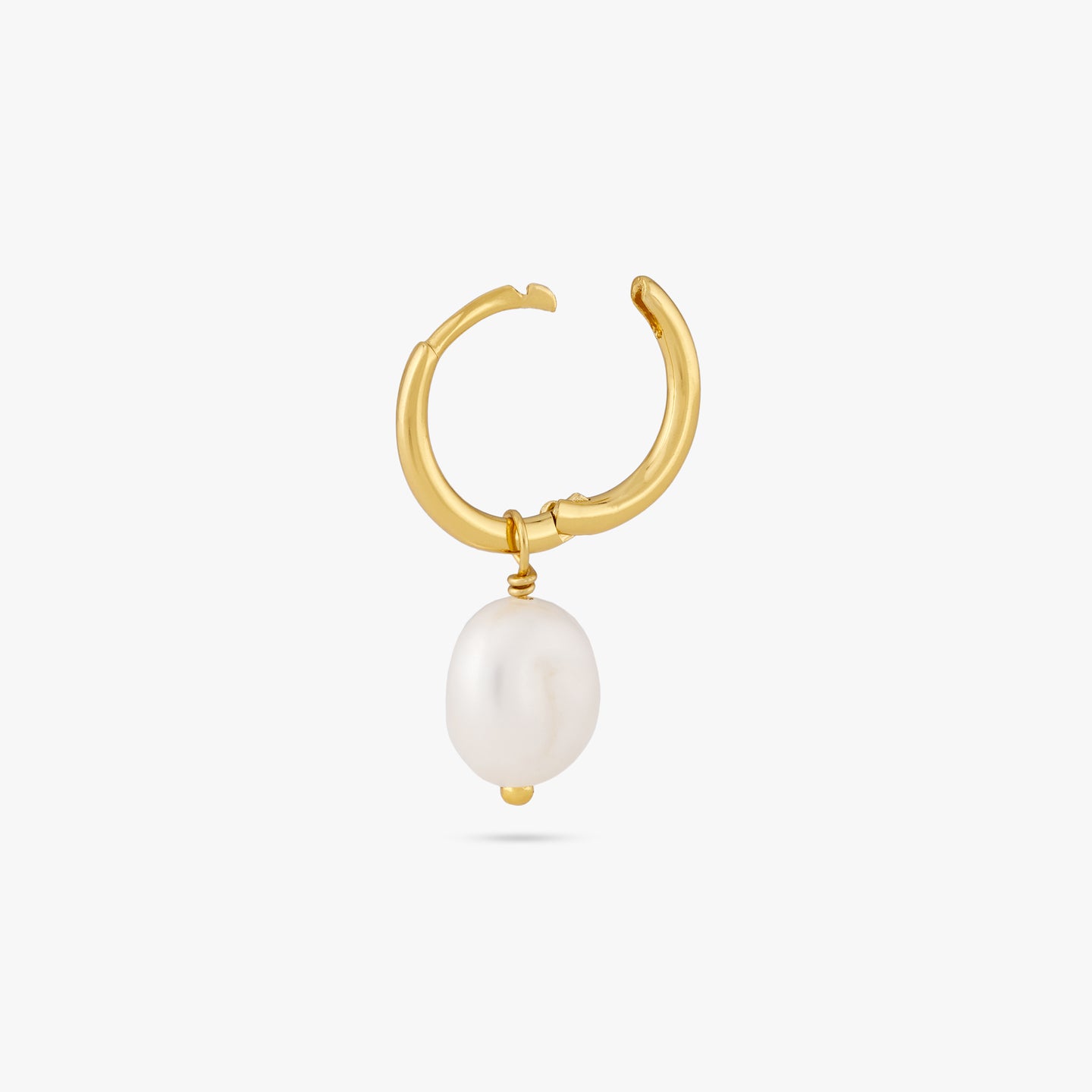 This is a dangling pearl huggie. color:null|gold
