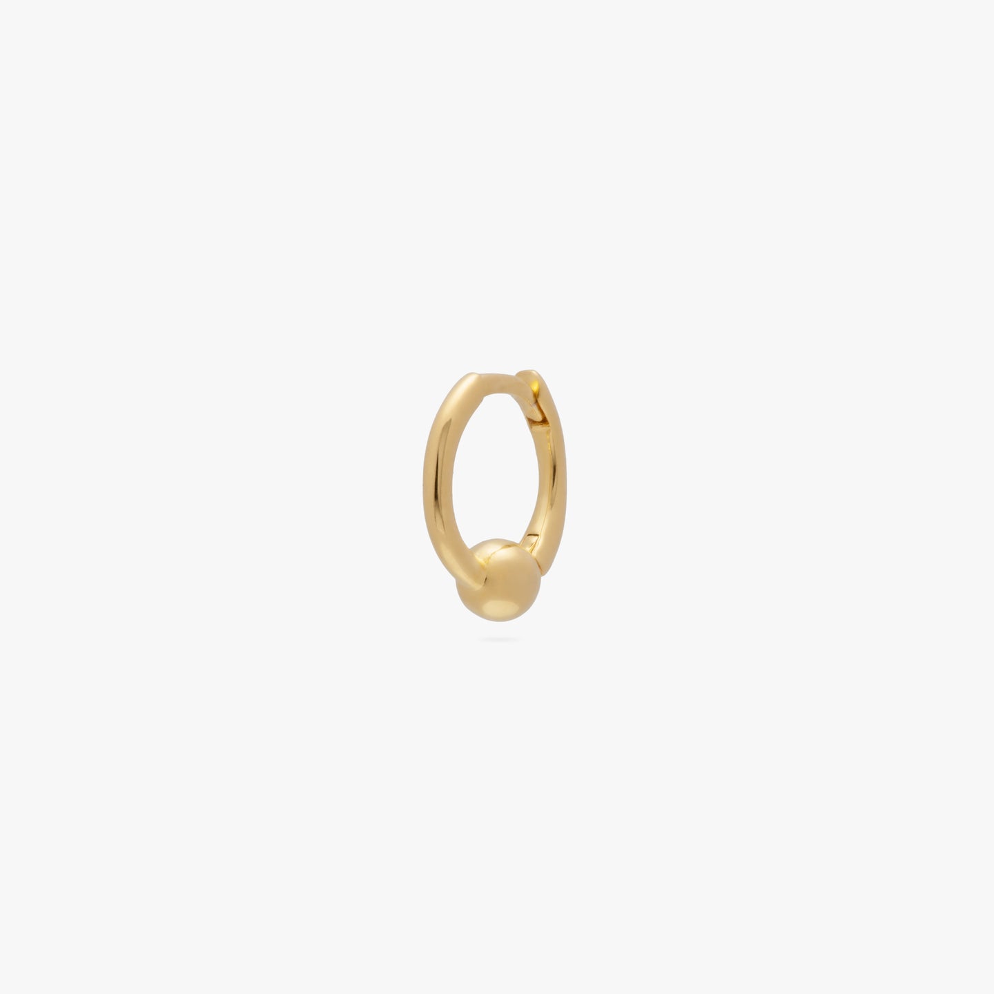 Mini gold huggie with a small gold ball color:null|gold