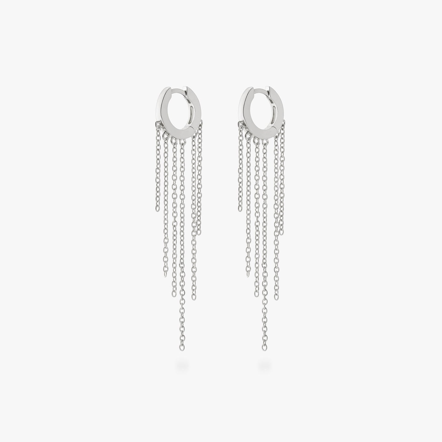 a pair of silver huggies with long gold fringed chain hanging from them [pair] color:null|silver