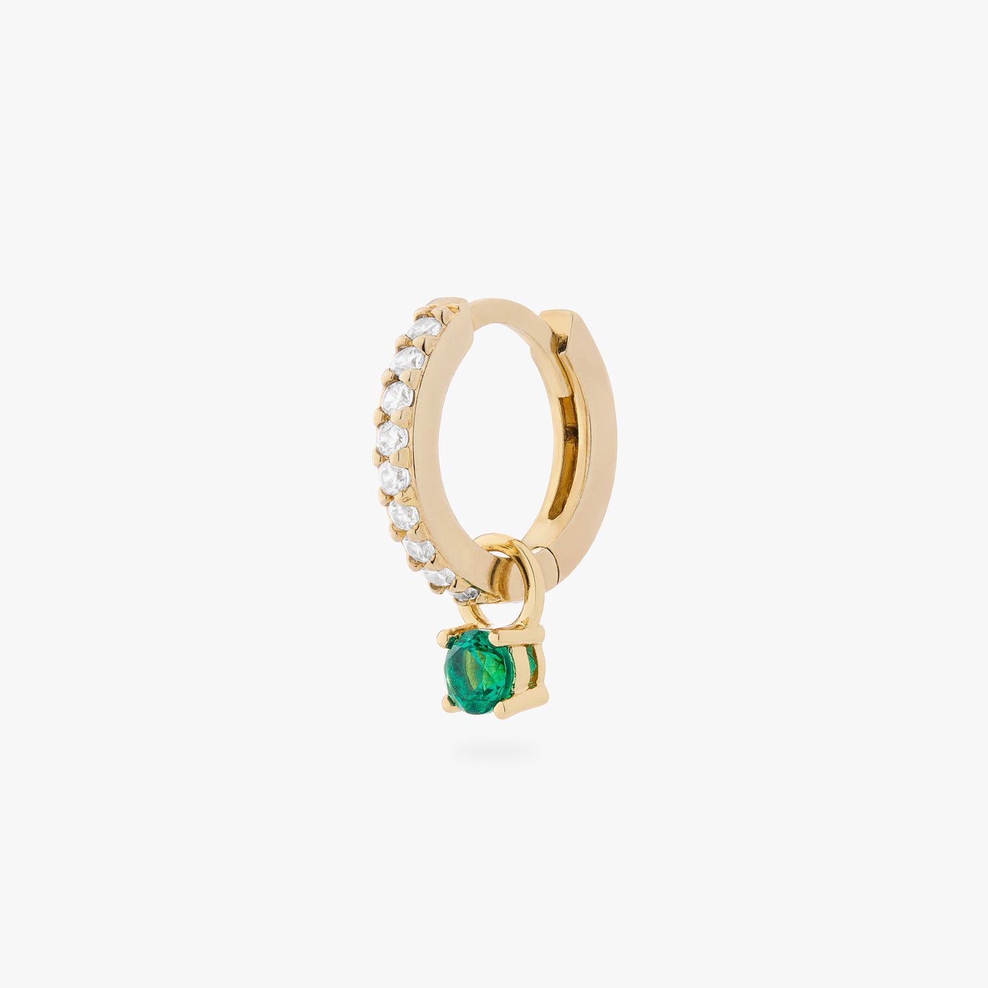 a gold/clear mini pave huggie with a green cz charm color:null|gold/green