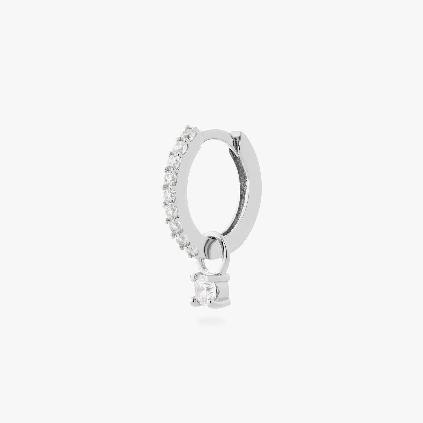 a silver/clear mini pave huggie with a clear cz charm color:null|silver/clear