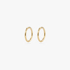 This is a gold clicker earring [pair] color:null|gold
