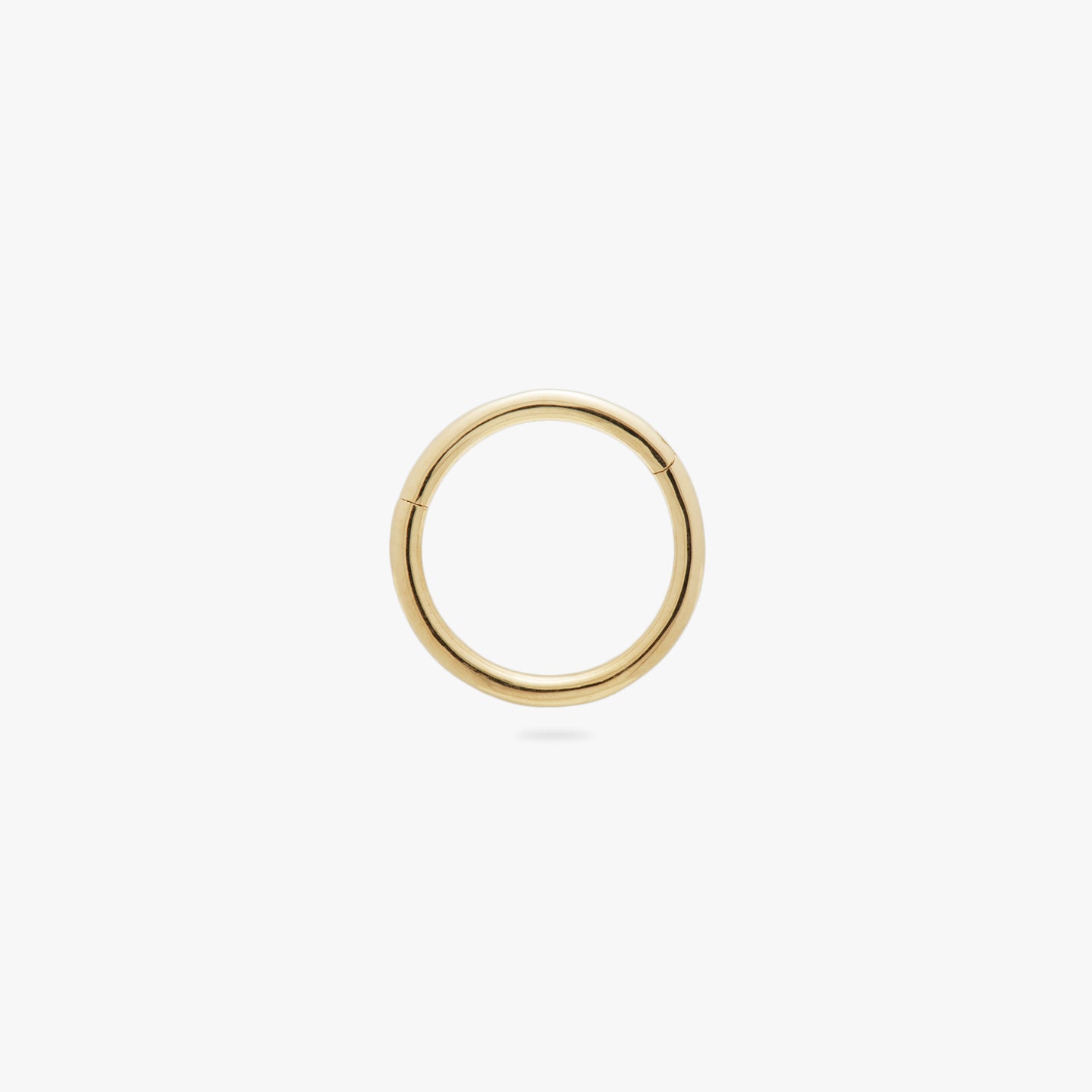 This is a gold clicker earring color:null|gold