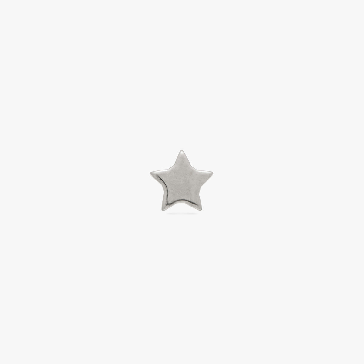 This image is a silver toned titanium star-shaped flatback stud on a white background. 