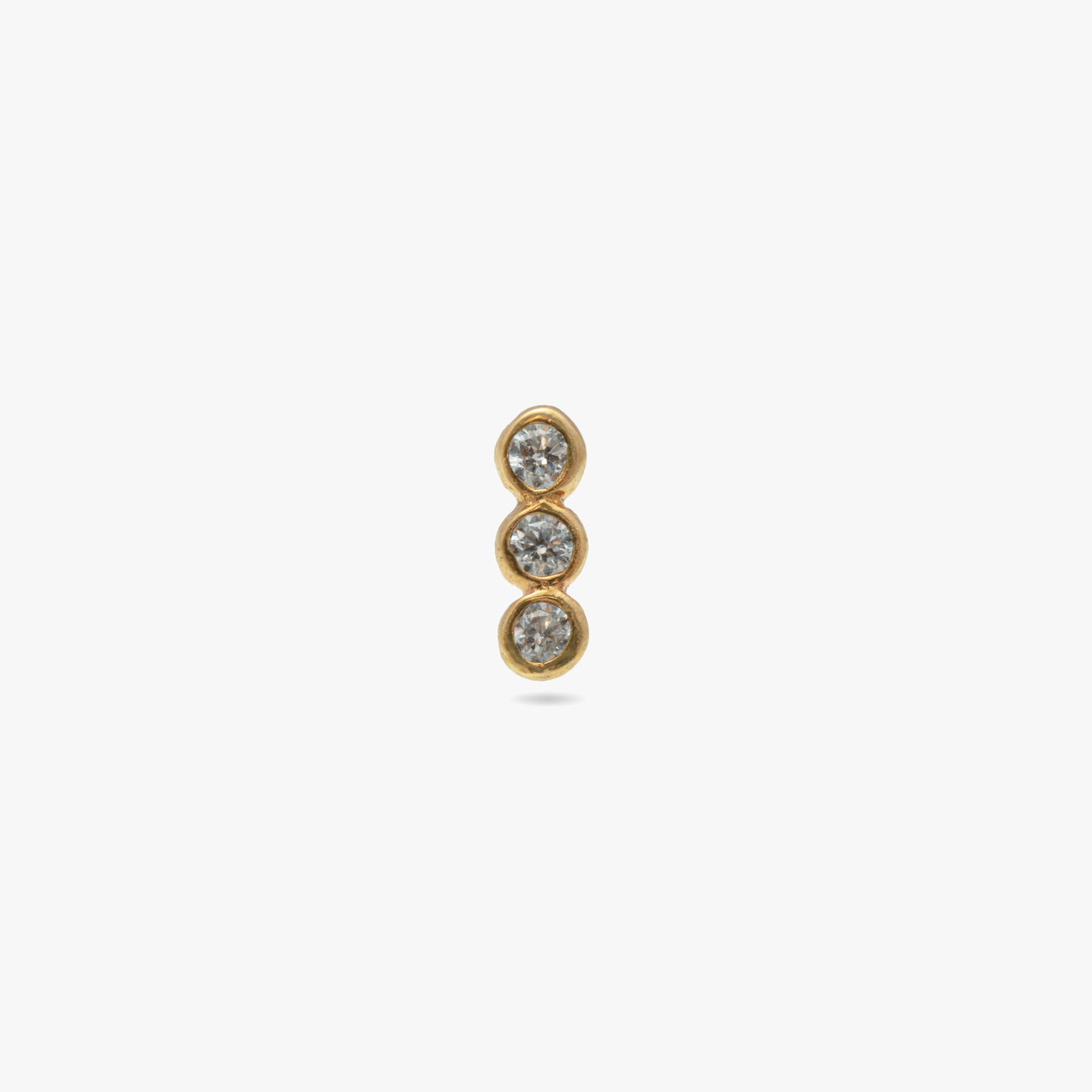This is a 14k gold bar stud with 3 bezel CZ's color:null|gold/clear