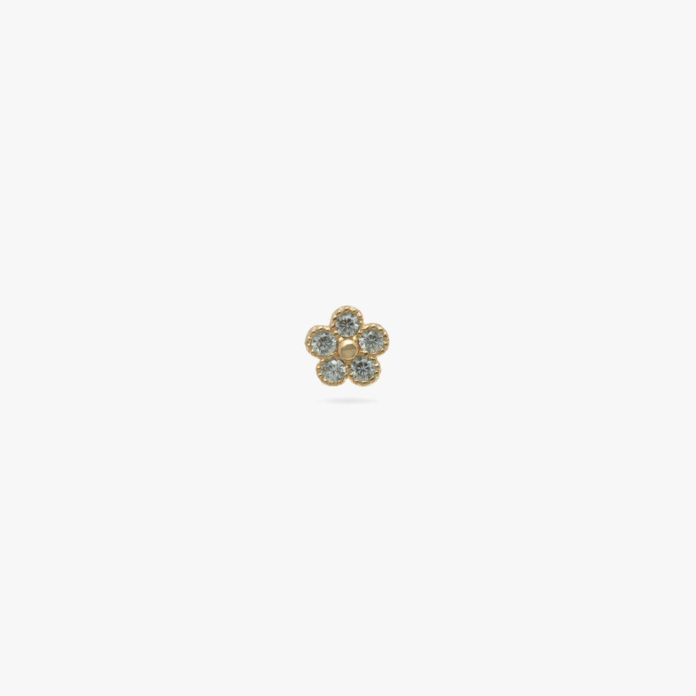 This is a 14k gold stud with CZ's in the shape of a daisy color:null|gold