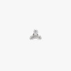 This image is a silver toned titanium flatback stud with a titanium center and three crystal CZ stones forming a triangle against a white background. 