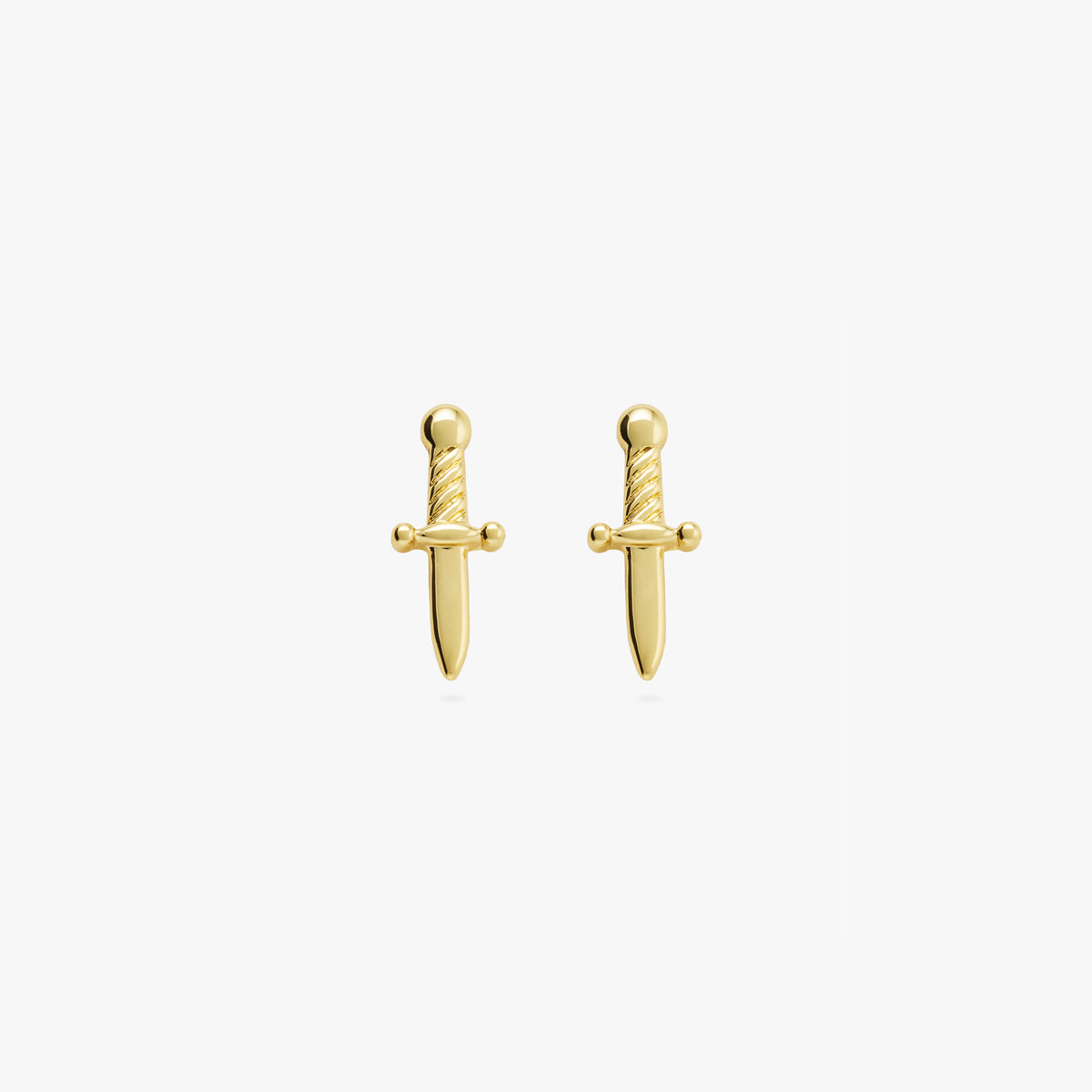 this image shows a pair of gold plated dagger studs 
