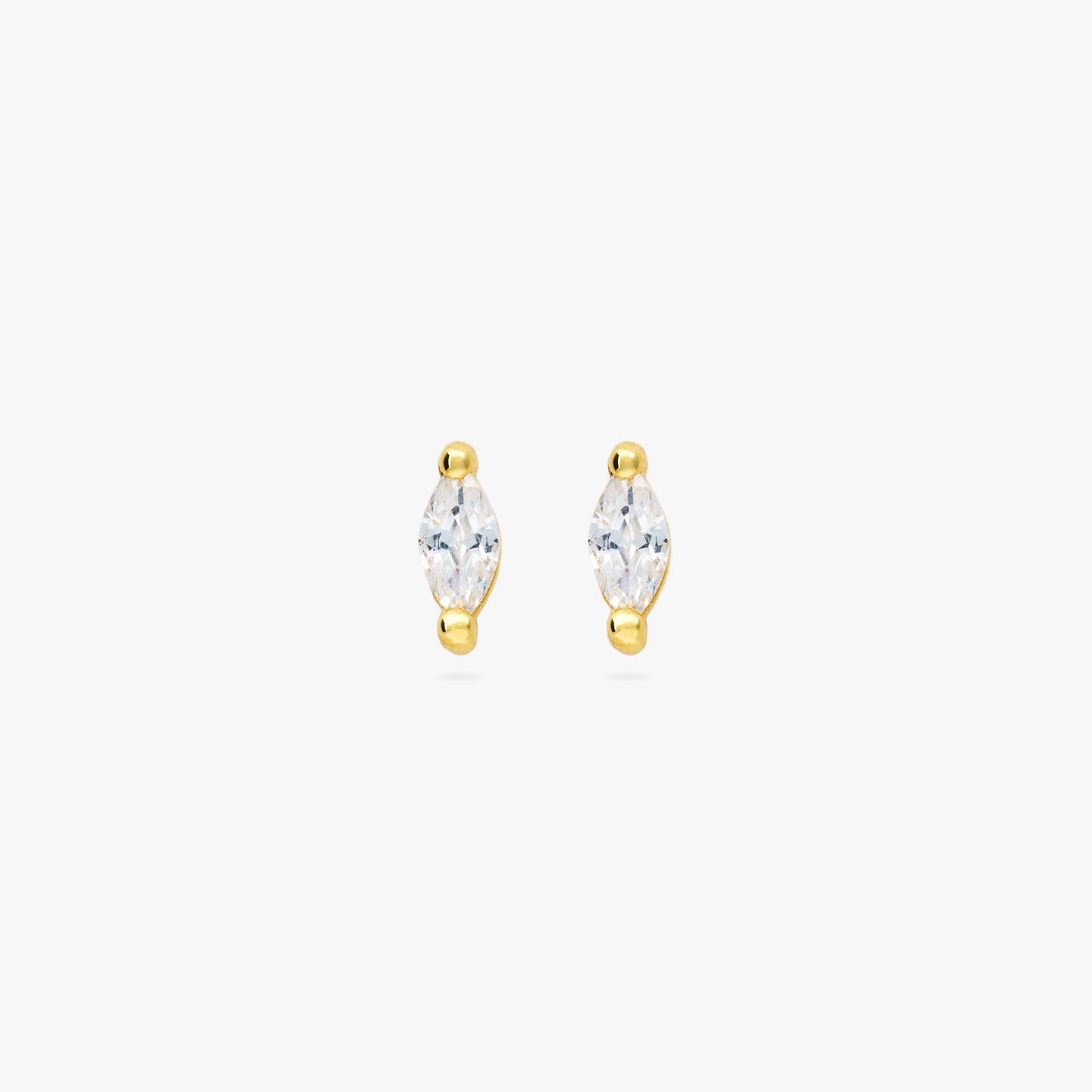 This is a pair of marquise mini studs featuring clear oblong shaped gems and has gold accents. [pair] color:null|gold/clear